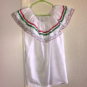 On the shoulder traditional Mexican top